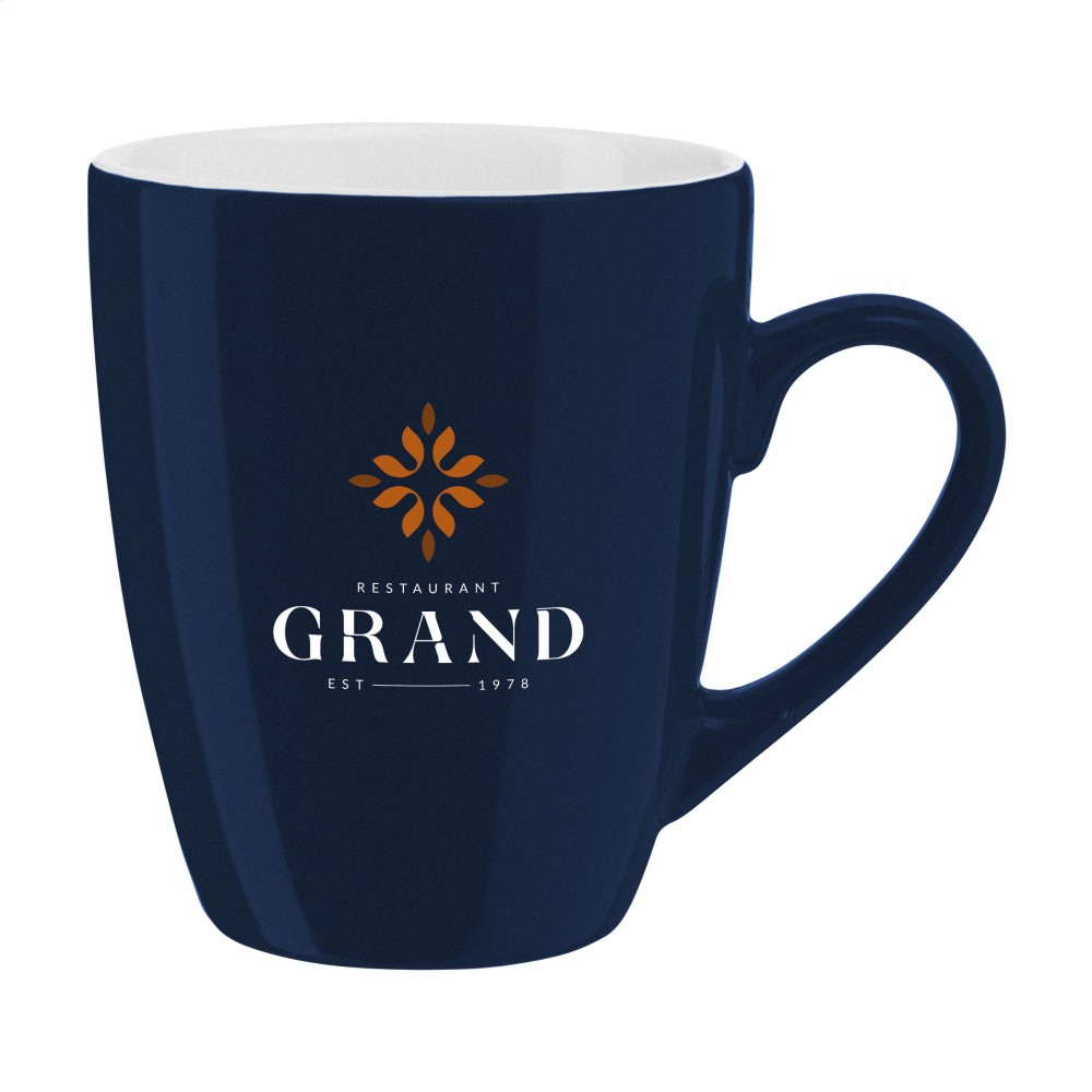 Zonia mug with blue and white colour and a capacity of 31 cl.